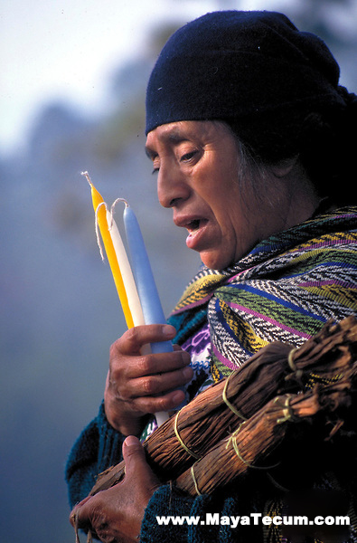 A K'iche' Maya woman priestess leads an indigenous spiritual ceremony near San Andres Xecul, Guatemala.